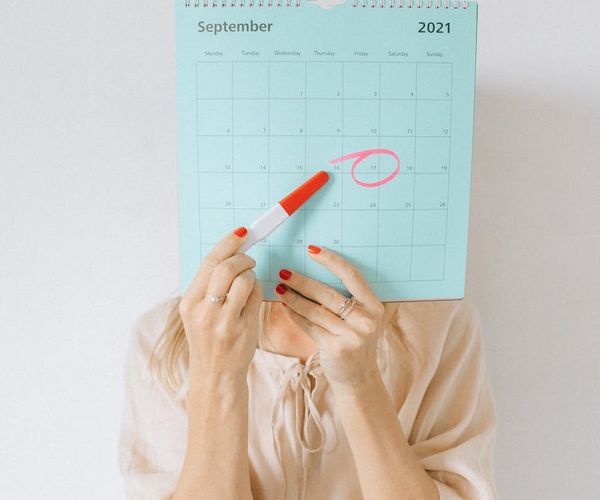 Calendar with marked dates, symbolizing consistency in training schedule.